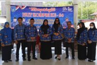 Caption: Sekretaris Daerah (Sekda) Kota Langsa, Dra. Suhartini, S. Pd, M. Pd yang juga menjabat sebagai Ketua KORPRI Kota Langsa didampingi oleh para Asisten Pimpinan Perangkat Daerah (OPD).