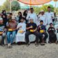 Caption: Foto bersama anak-anak yatim, Region Head Yudhi Cahyadi(tengah), Region Operation T. Zein Ikhwan (kiri), Region Bussines Support Ifri Handi Lubis( kanan).